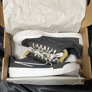 Nike Black and White Sneakers with Classic Design